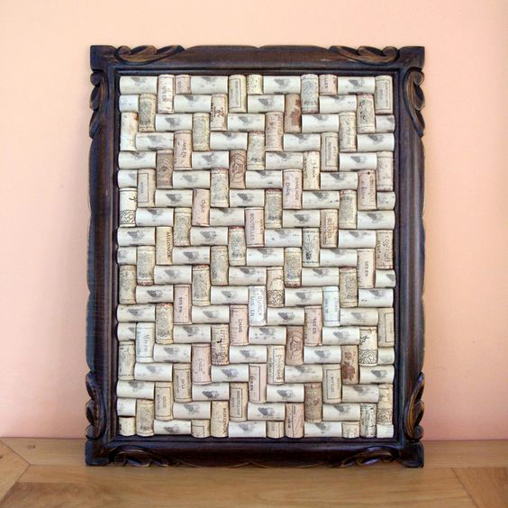 bulletin board made out of corks arranged in a zigzag pattern in old wooden frame