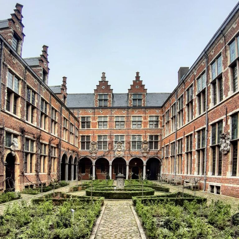 inner courtyard of big classic, red- brick building